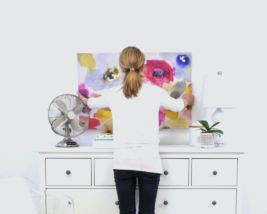 How to hang canvas art above a dresser